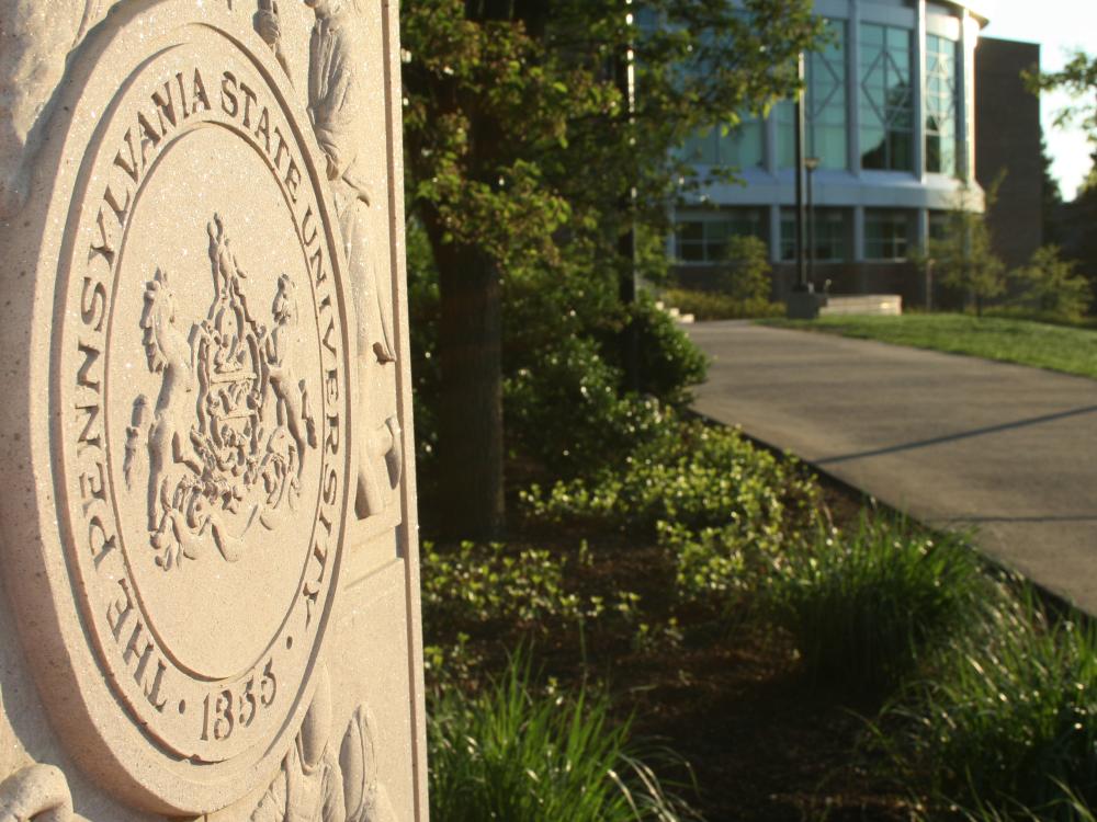 The Pennsylvania State University seal in back of the HUB